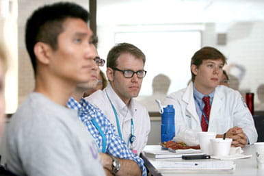 Students attending small group lectures focused on pediatric pulmonary-related clinical topics.